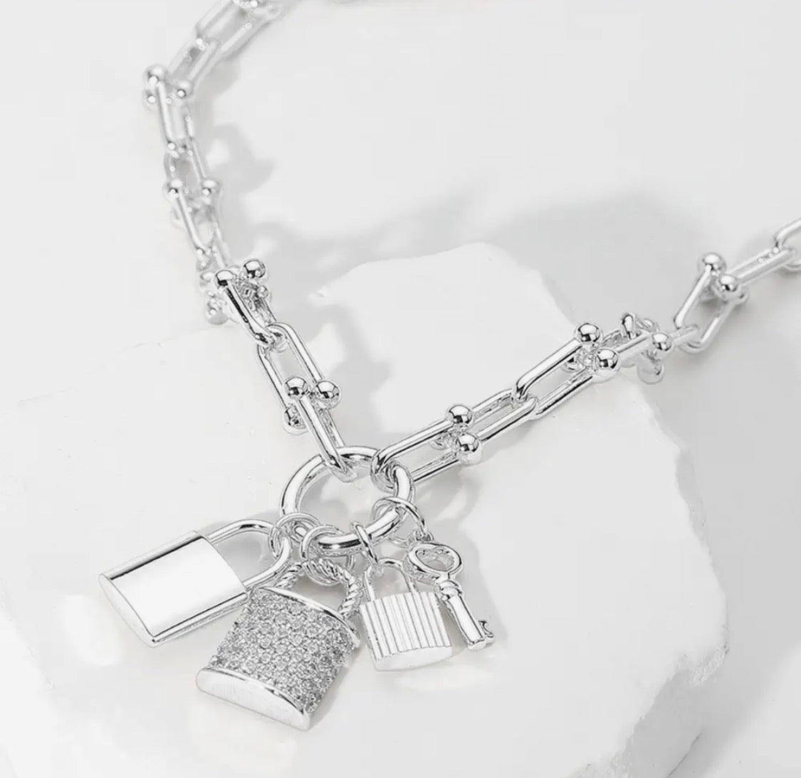 INSPIRED CHAIN WITH LOCK CHARMS