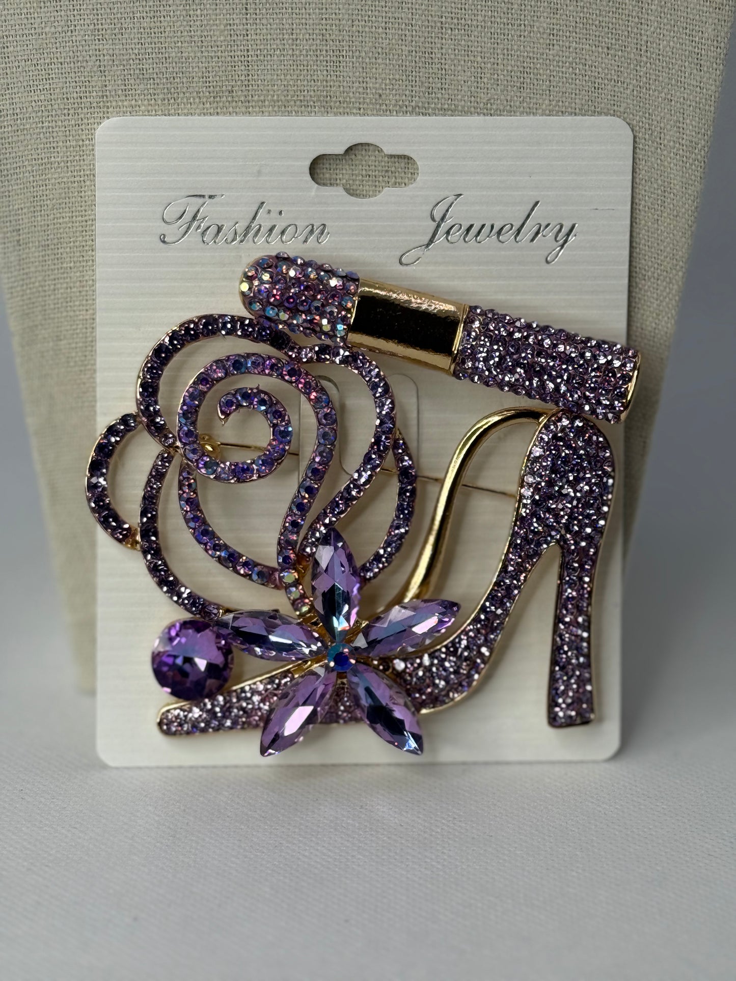 Heel lipstick brooch