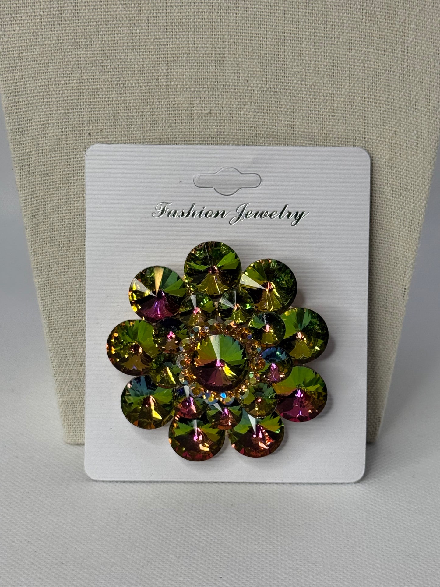 Oil spill brooch