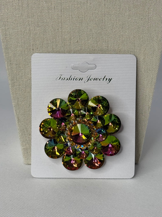 Oil spill brooch