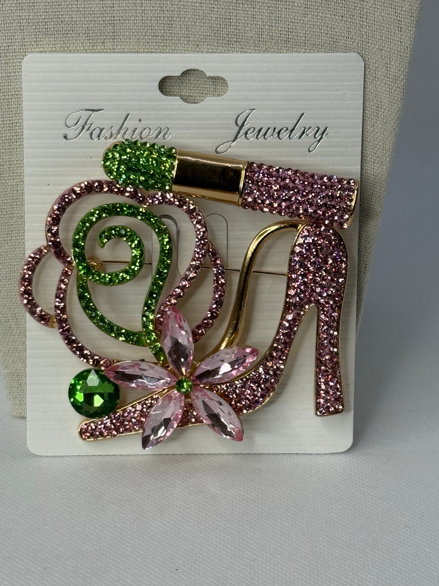 Heel lipstick brooch