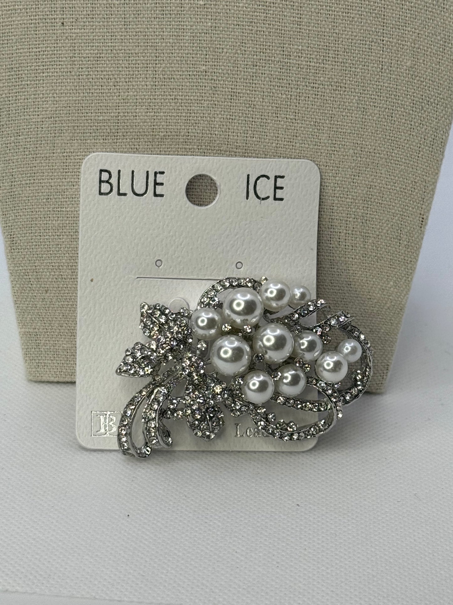 Silver pearl brooch