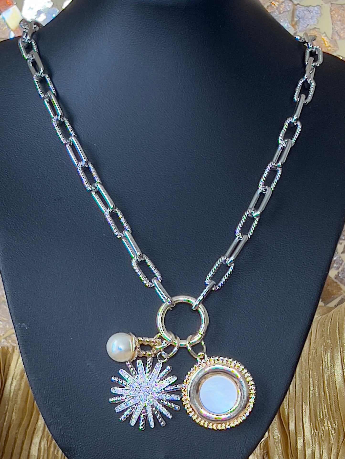 Starburst charm necklace